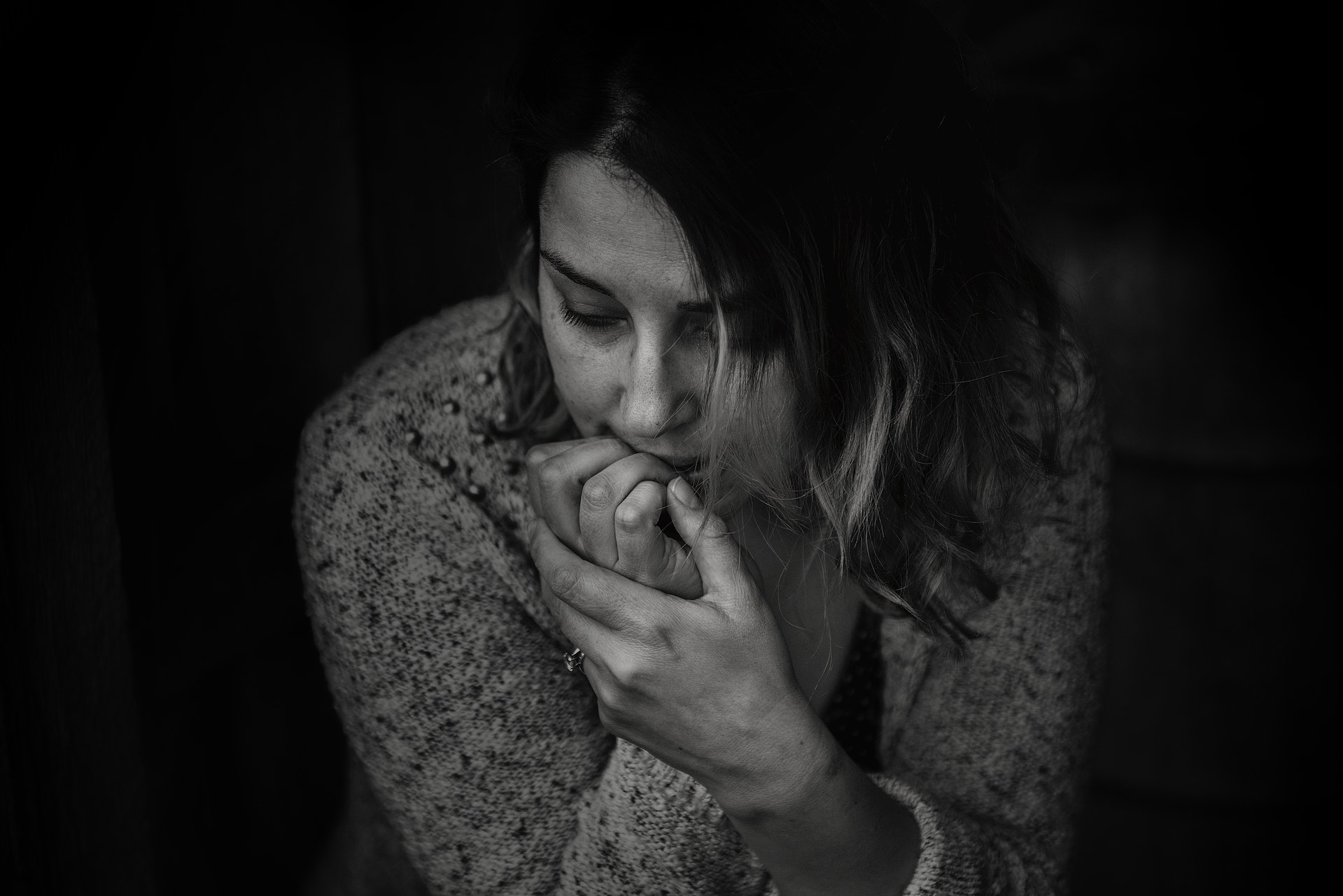 Image of a Woman Biting Her Nails